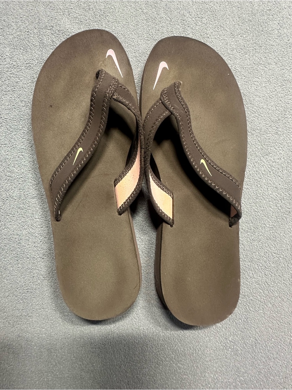 Nike Brown Flip Flop Sandals with Pink and Pale Yellow Nike Swooshes